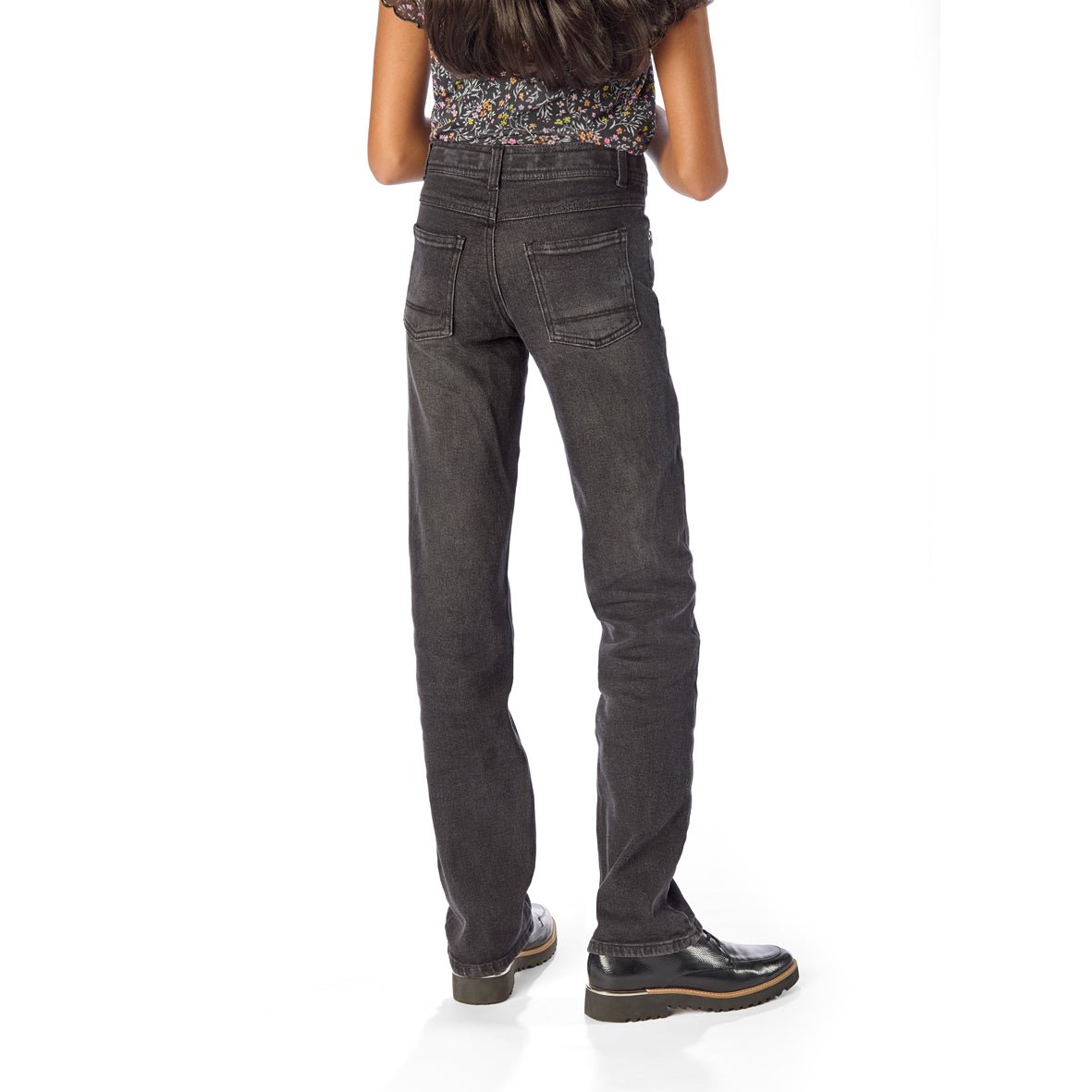 Back of Tall Thin Girl Wearing Slim-Fit Extra Long Tall Black Jeans / StiltBird Apparel